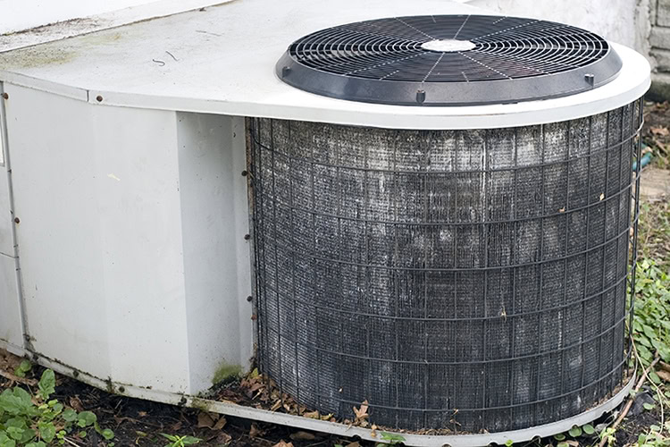 Air Conditioning unit with salt damage from Gulf of Mexico. Air-Ton Heating & AC blog image.